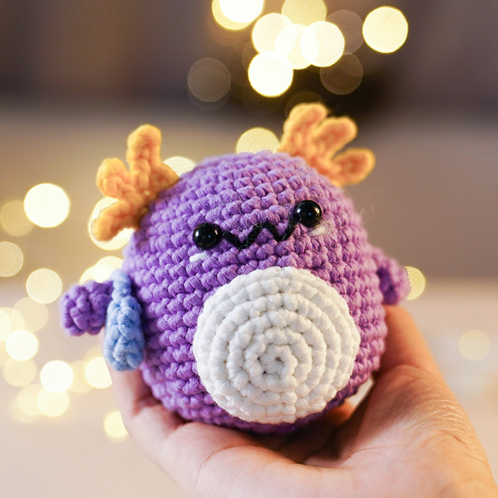 CrochetBox Complete Crochet Kit for Beginners - Axolotl lying